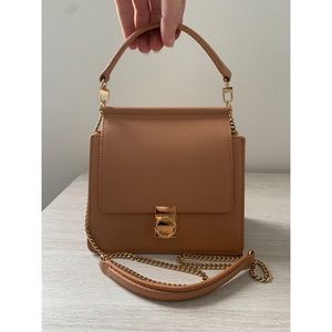 Polene numero sept mini. Tan textured leather.